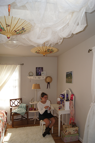 Unique ceiling treatment in a teenage girl's bedroom